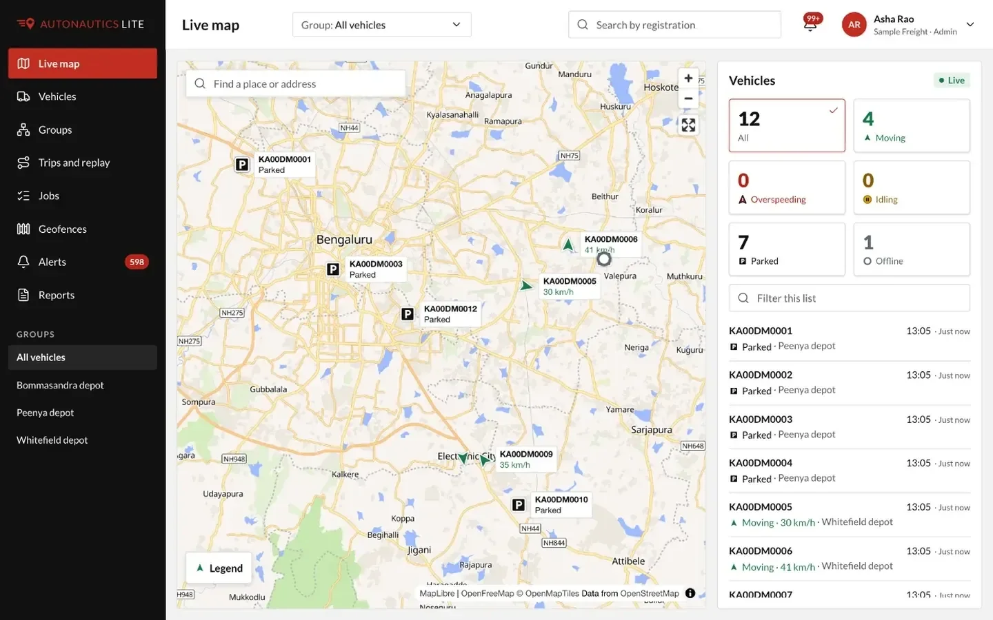 Autonautics Lite live map showing a sample fleet around Bengaluru, with moving and parked vehicles and a vehicle list